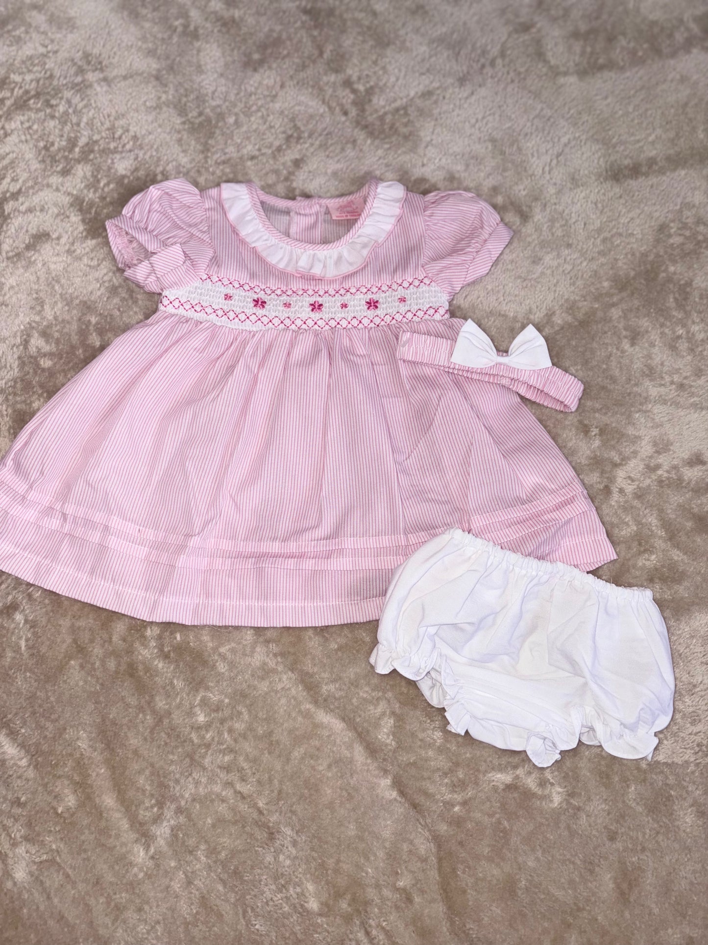 Pink and white smocked dress