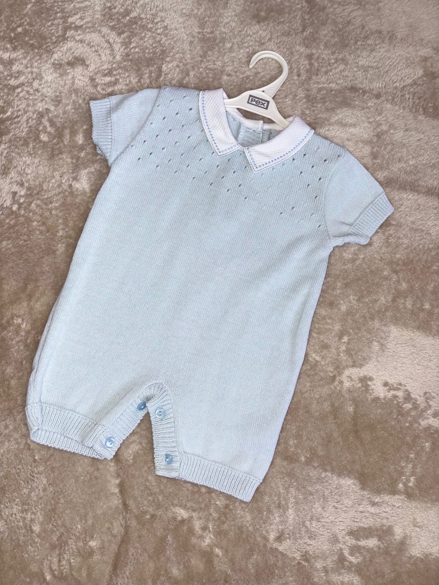 Blue knitted romper