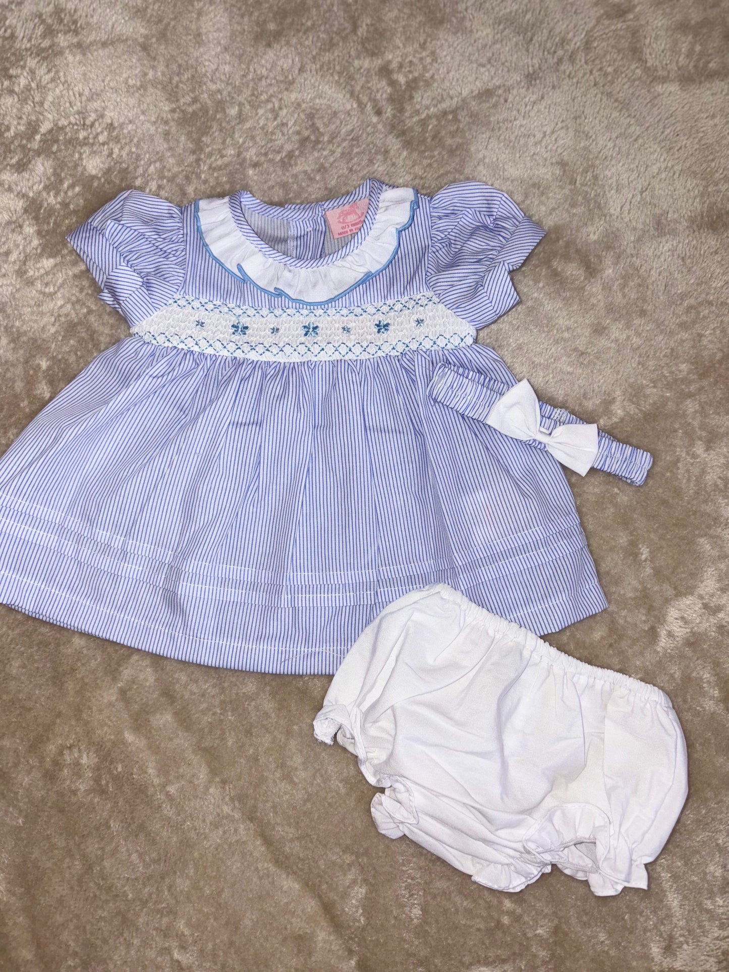 Purple and white smocked dress