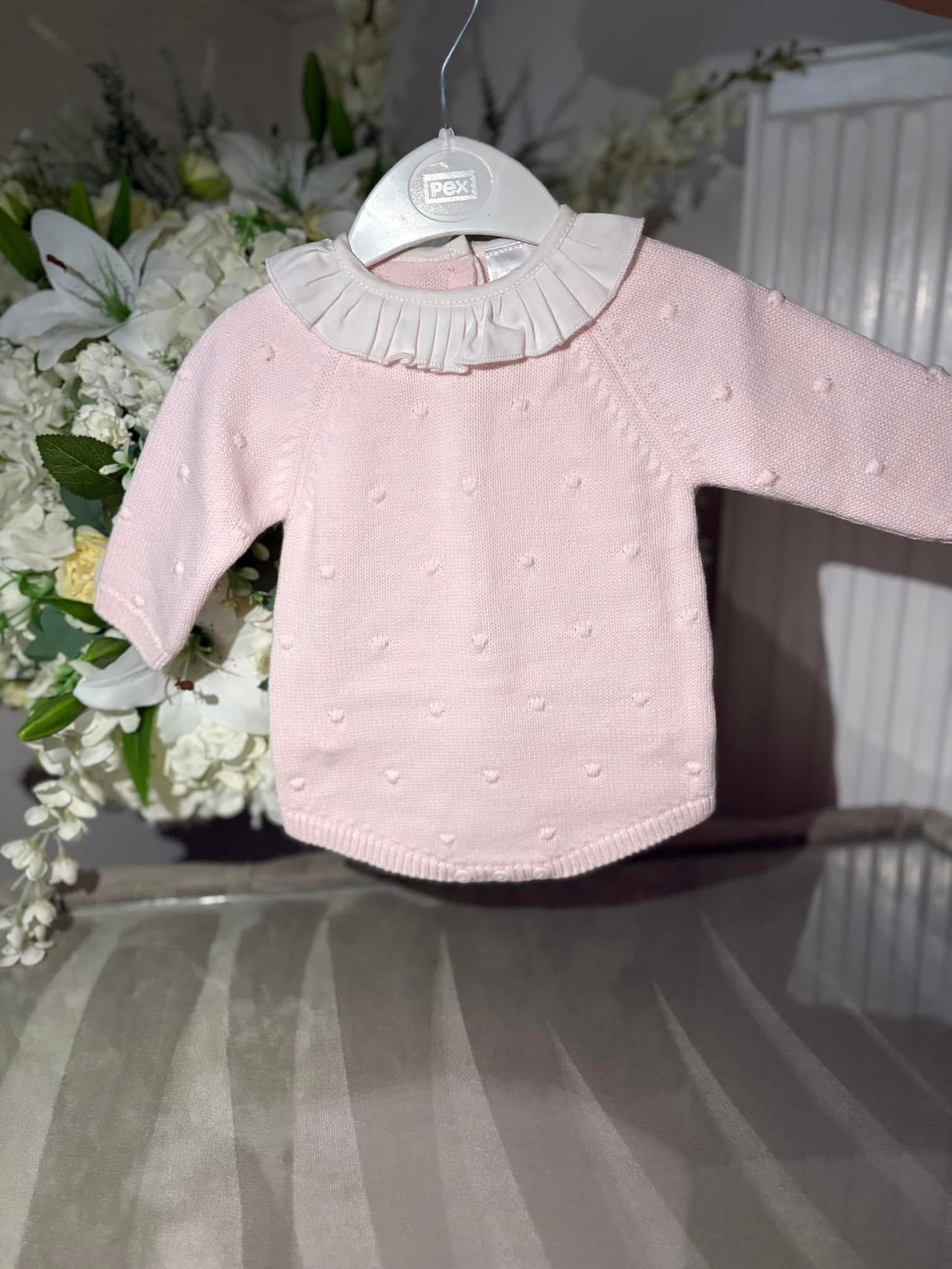 Pink spotty romper